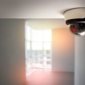 security camera surveillance installed on ceiling to monitor for privacy and protection